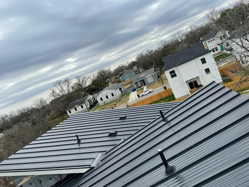 Standing seam metal roof panels with vents for Skylight Repair in Herrin
